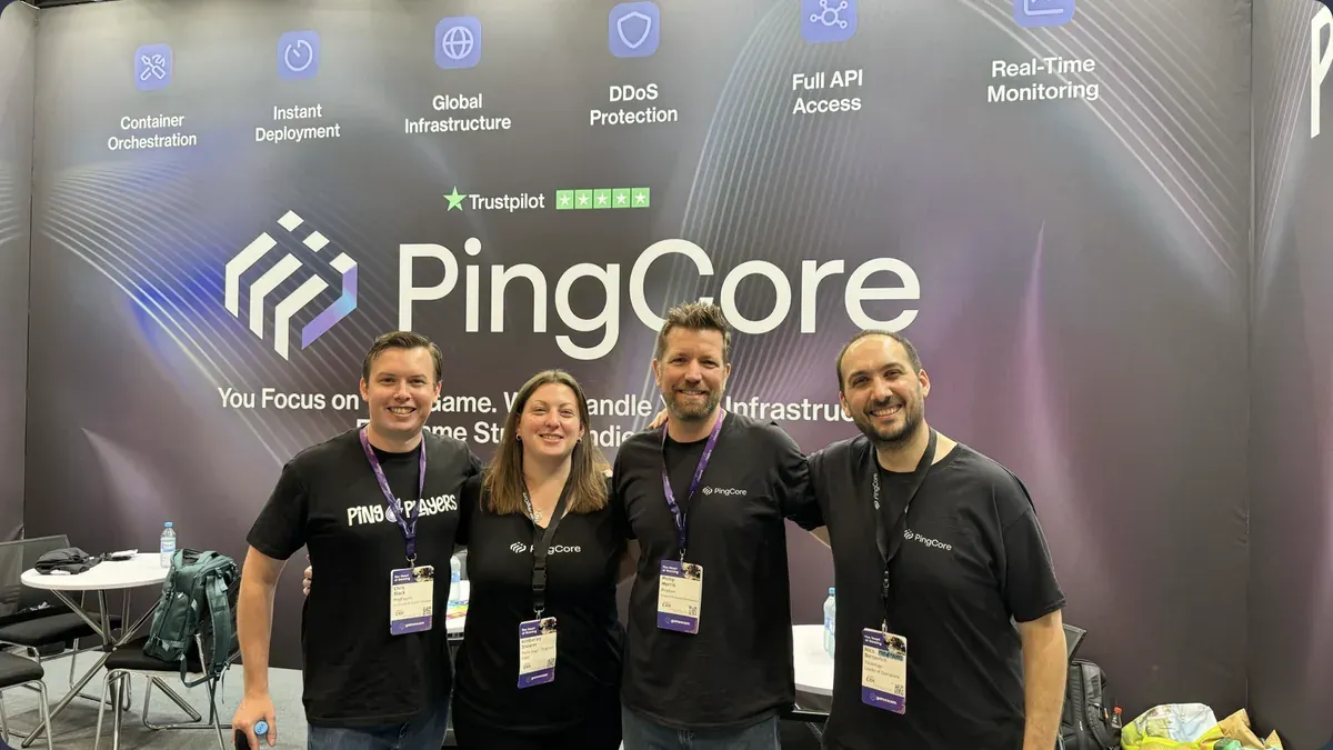 Four of the team on the stand at Gamescom 2026 in Cologne